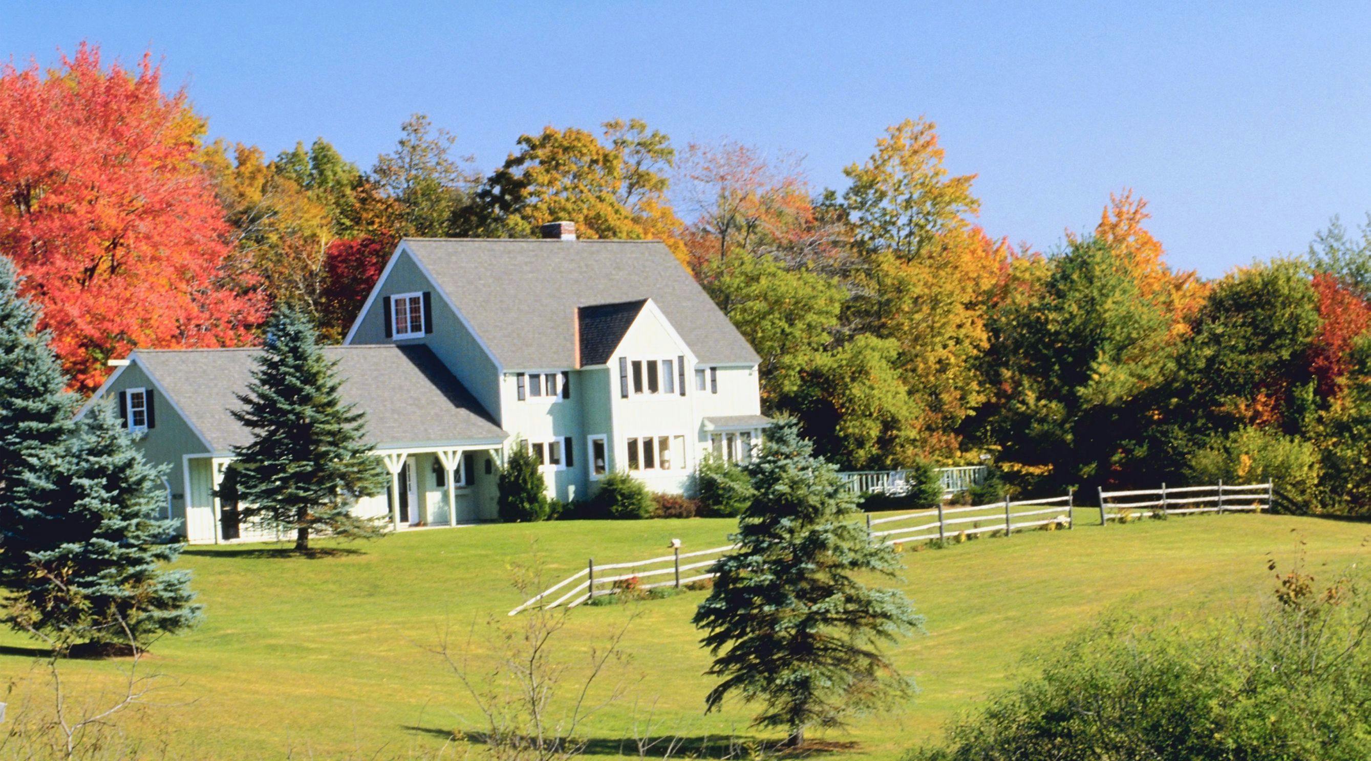 large white house on green lawn